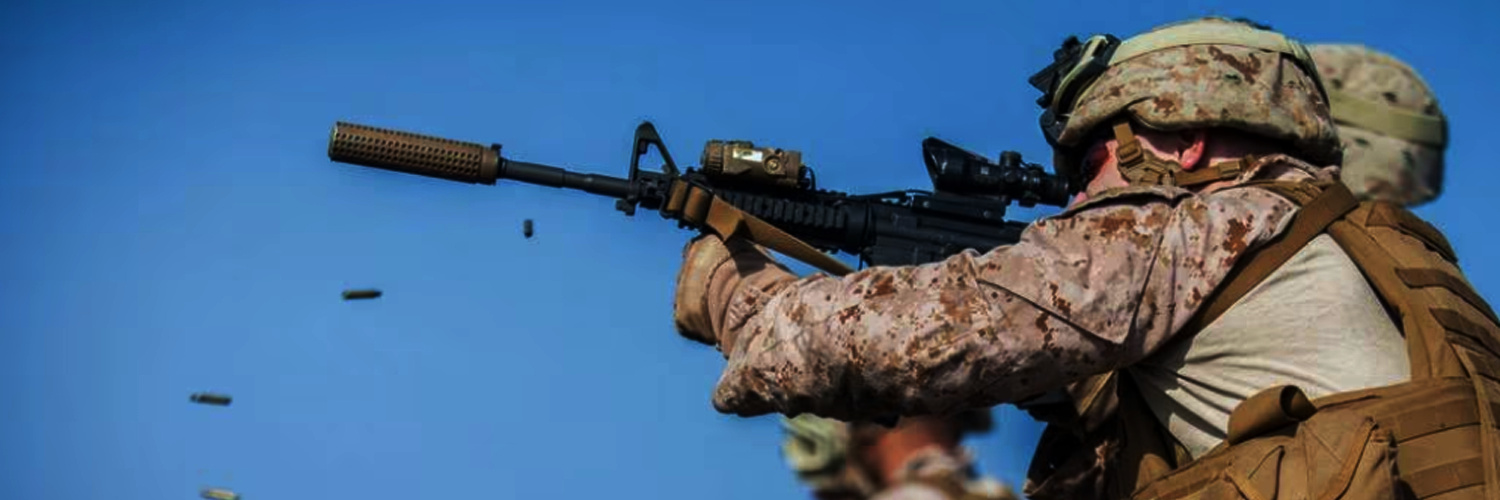 US Military shooting with a GWOT era rifle and suppressor